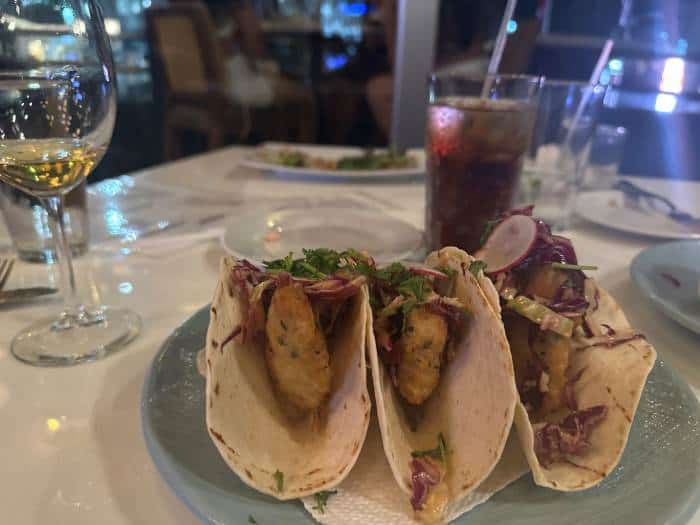 Three tacos in a restaurant in San Juan Puerto Rico looking delicious and inviting!