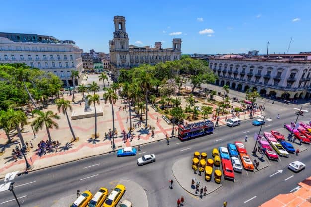 Parque Central, or Central Park, on the verge between Old Havana and Central Havana in the Cuban capital. Filled with colorful classic American cars on a bright sunny summer day. 