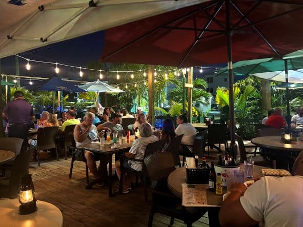 Great dining along Seven Mile Beach in Grand Cayman, there are a variety of restaurants to choose from. This one is super charming with parasoles, beautifully lit in the night. 