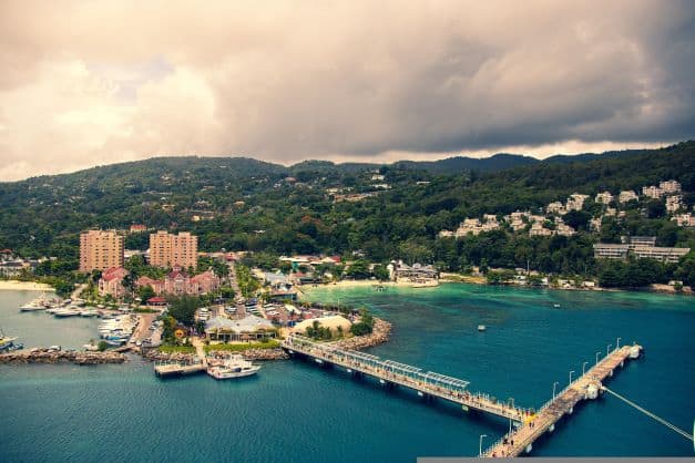 An aerial photo of the jetties at Ocho Rios Cruise Port that stretch into the blue ocean