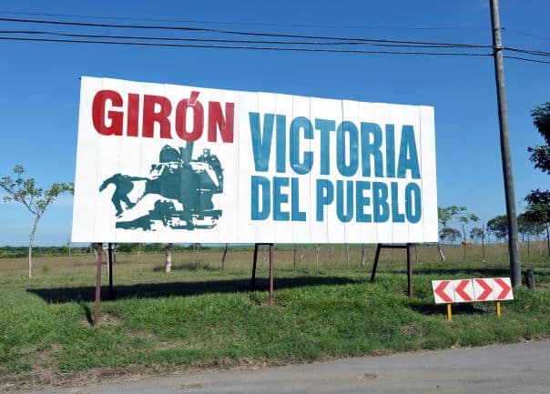 Large propaganda poster outside Cienfuegos towards the Bay of Pigs along the road saying Victory of the People