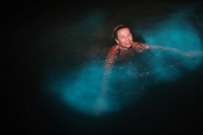 Swimming in the dark water surrounded by a blue shining light is a magic experinece, no wonder I smile at the camera!