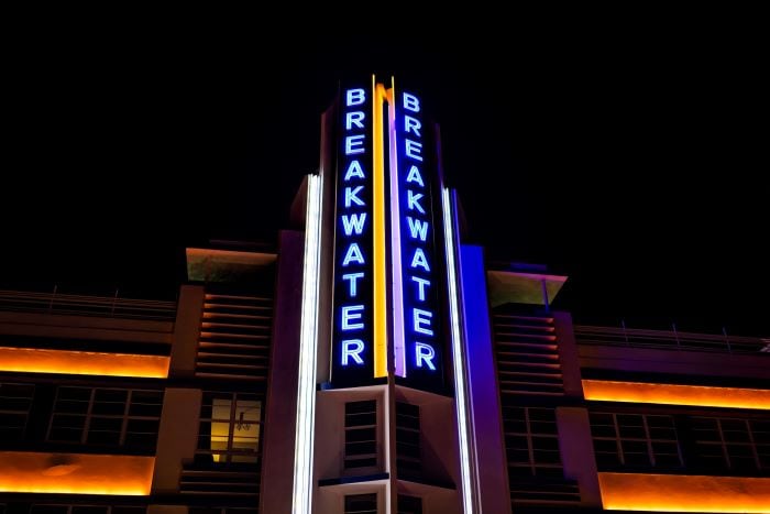 The neon lighting on the facade of the Breakwater Hotel in Miami Beach. 