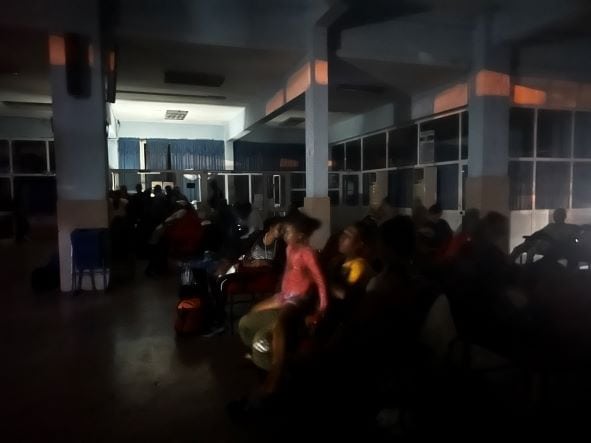 Traveling to Santiago, there was a blackout in a bus station as the electricity went away, and all passengers were seated in darkness waiting for it to come back