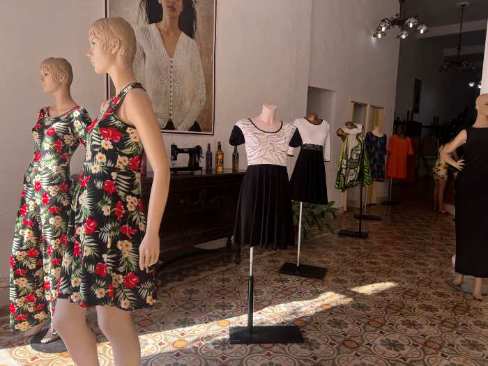 Cuban design in Cienfuegos shops along the Boulevard with a variety of dresses made locally