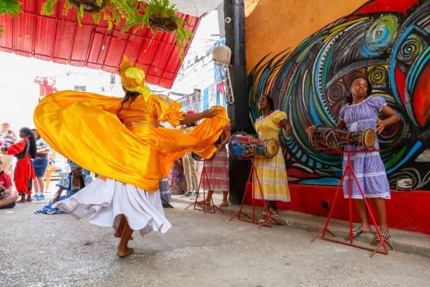 Dancing yoruba (santeria) women in Callejon de Hapmel in Havana. On sundays people come here to worship, with dance, music, and drums. 
