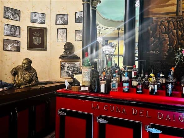 Hemingway real-life statue at the red bar in Floridita restaurant and bar, which was one of his favorite hangouts in Havana for the three decades he more or less lived in Cuba. 