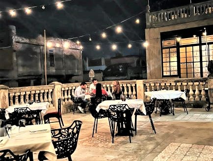 Can you see Cuba from Key West? Regardless, there are so many reasons to visit anyways! The rooftop seating area of La Guarida restaurant in Central Havana, with amazing ambiance, views, food, and sometimes also live music!