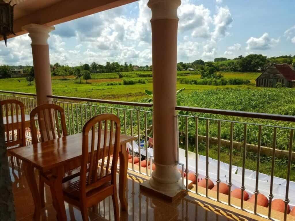 Charming patio at Casa Las Mary in Vinales, with spectacular views of green fields
