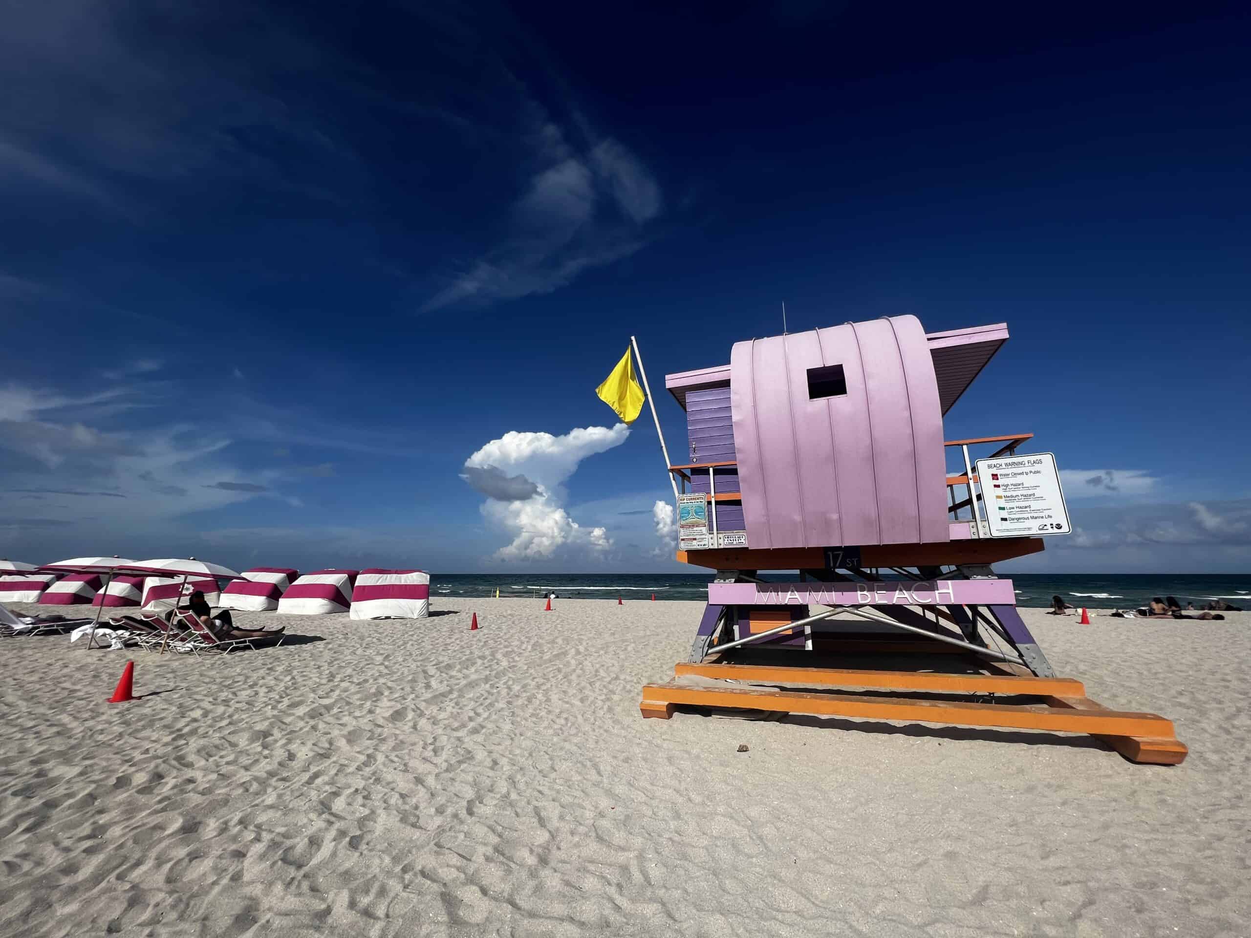 One of the famous life guard stations in Miami Beach, a bright pink one on the warm light sands