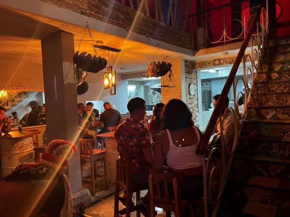 The cozy atmosphere with warm lighting in O Sole Mio Bar in Old Havana