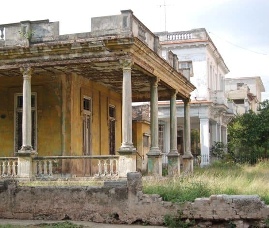 Beautiful but neglected villas in the Vedado in Havana, with large balistrades decorated with white marble columns