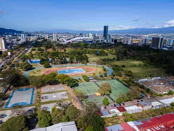 The Sabana Metropolitan Park area with tennis courts, and lots of leisure activity possibilities, with the city in the background