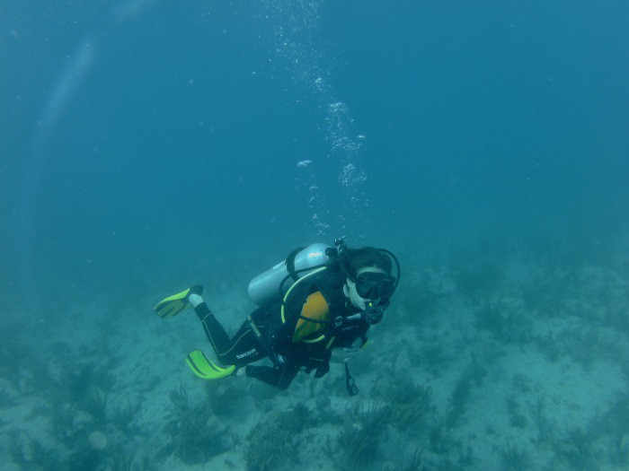 Scuba diver hovering over the sandy botton in Varadero Cuba