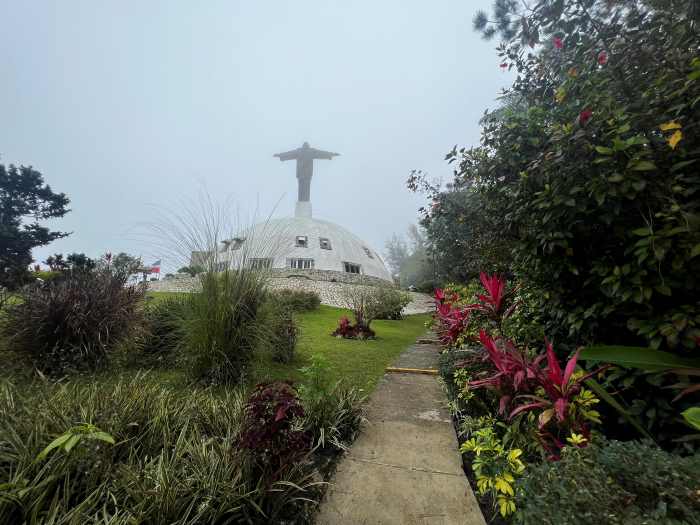 The statue in the fog of Christ on Mount Isabel de Torres