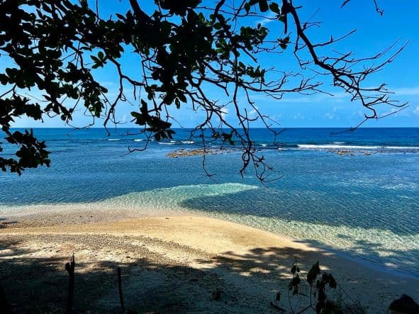 A small secluded beach just outside Ocho Rios, with golden light yellow sands and crystal clear waters
