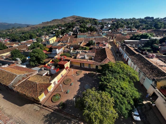 View of Trinidad city and its terracotta rooftops on a bright sunny summer day