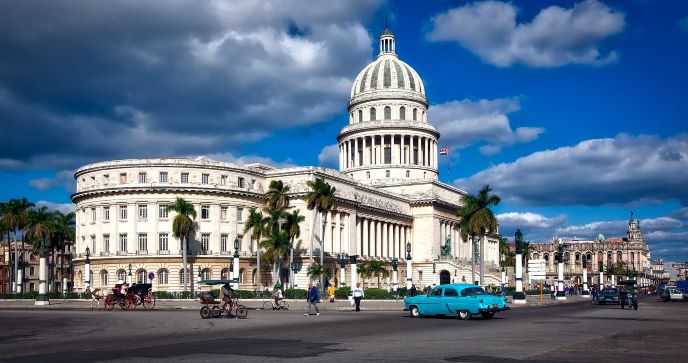 The elegant white Capitolio building with the large dome in Havana on a bright sunny summer day