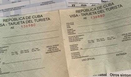 The green Cuban tourist card that you receive blank and need to fill out yourself before entry. 