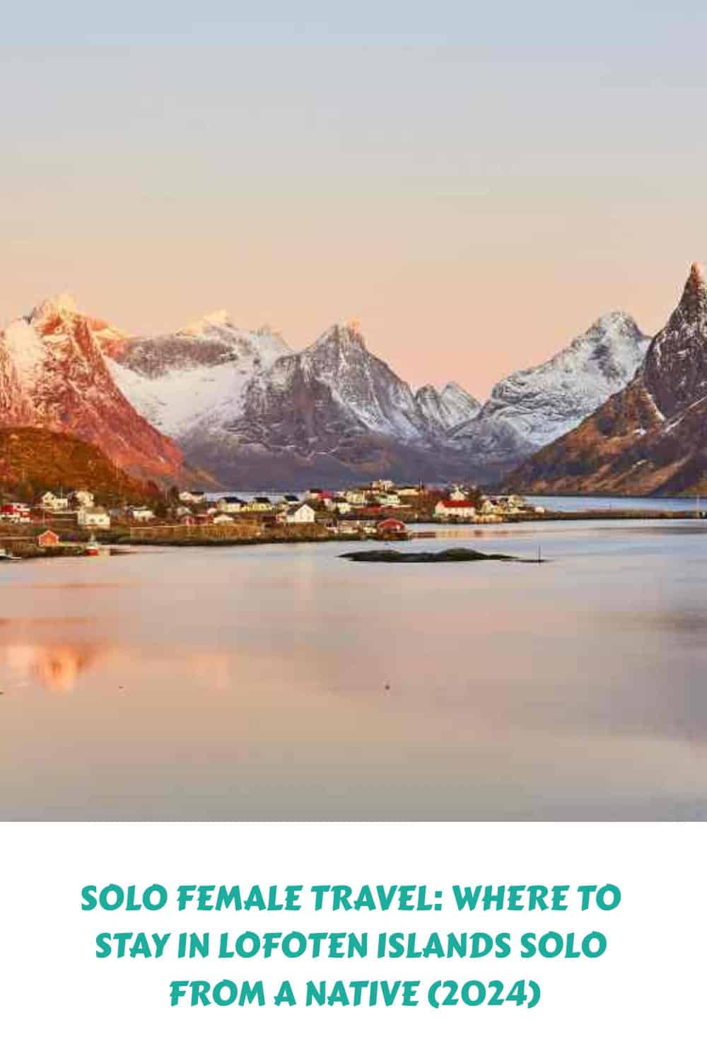 Blank sea in front of a majestic mountain range with snow covered peaks in golden light from a low winter sun