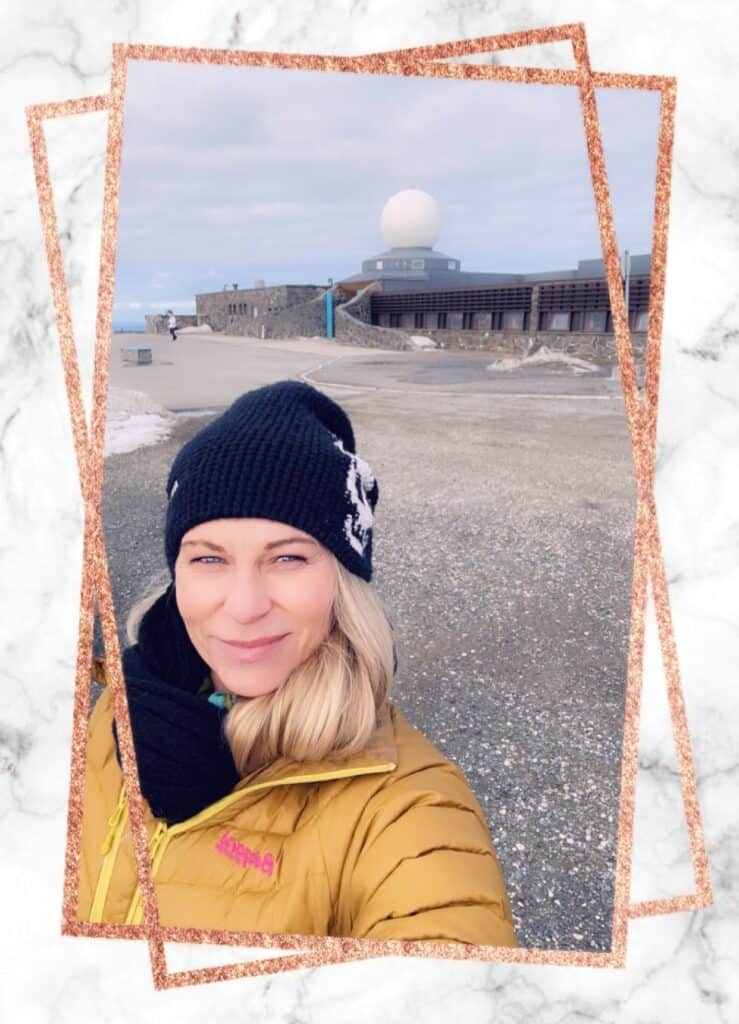 Photo of the blog owner, Hege, in front of the iconic North Cape in Norway