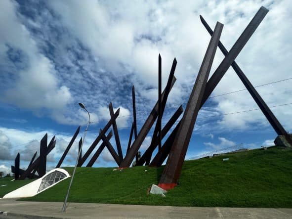 The vast iron monumnet at the Plaza de la Revolucion in Santiago de Cuba on a sunny day, the huge iron spikes under the blue sky 