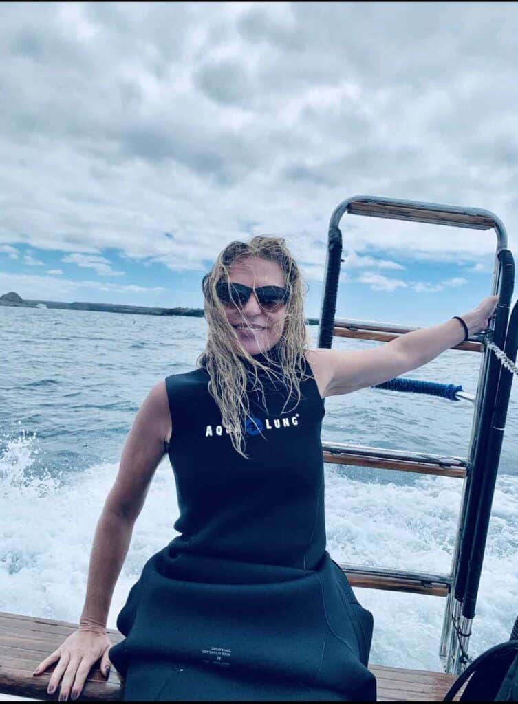 Woman smiling on a boat in high speed